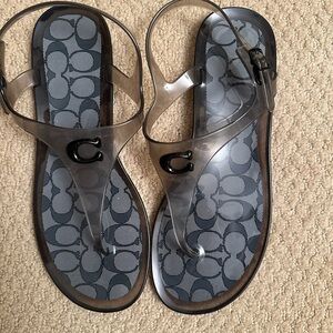Women’s rubber coach sandals size 10